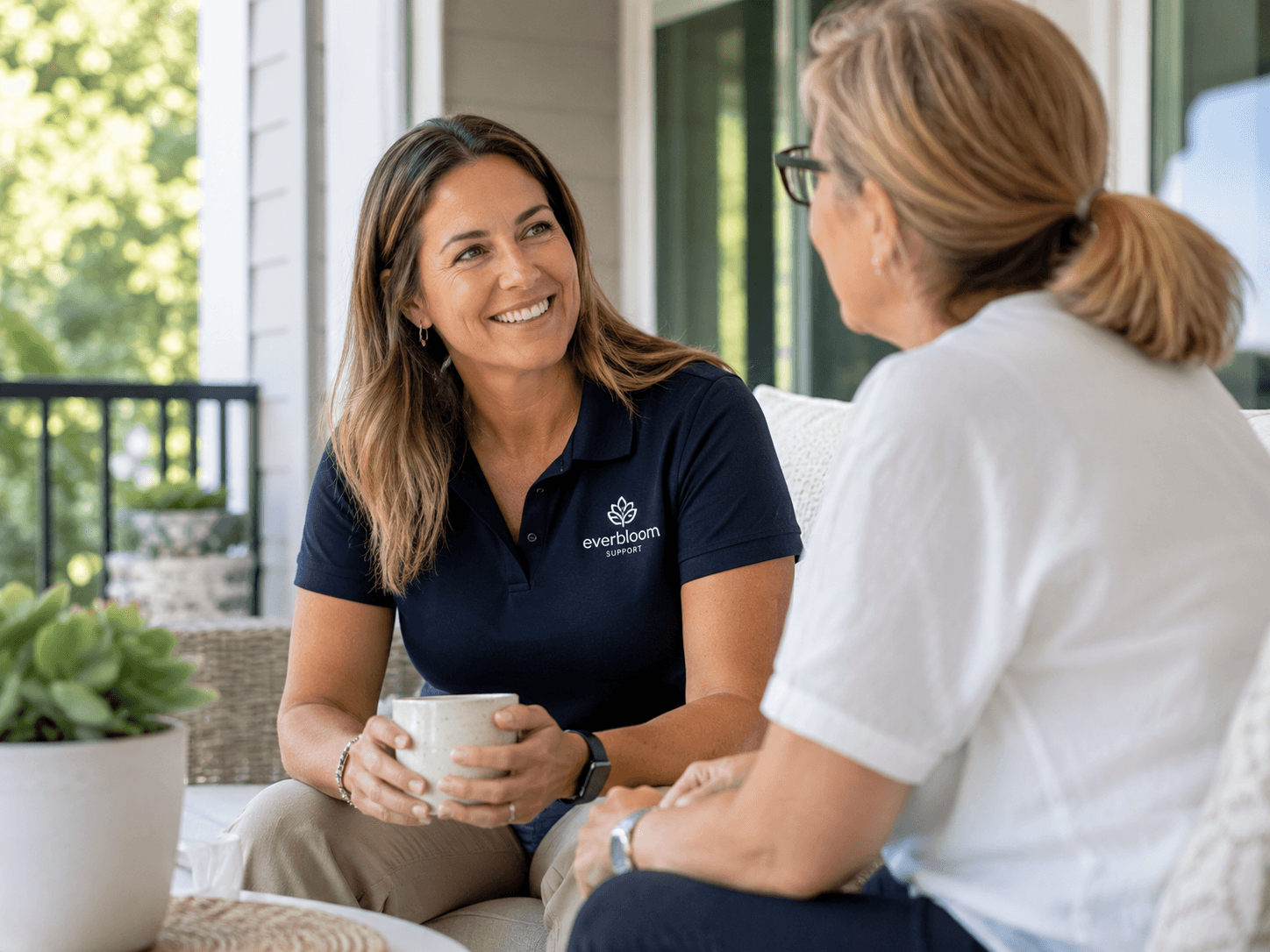 Two people sharing a warm conversation together outdoors